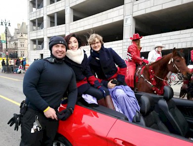 Grand Martial's for Americas Thanksgiving Day Parade pictured with Financial Operations Manager Derek Wroblews