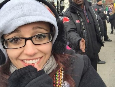 Security officer keeping a "Big Sean" Fan away from his Float during the Thanksgiving day Parade.