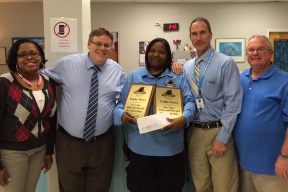 Venita Moses Service Above and Beyond award: Ms Vaughn, Jake Graham, Officer Venita Moses, Assistant Principal Valant, and Dean Morgan.